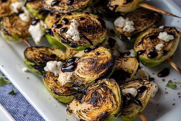YUM:  Brussels-Sprout Skewers with Balsamic Glaze and Goat Cheese